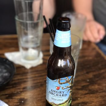 The Well - a bottle of beer on a table - Bars Near Me - Detroit, Michigan The Well - a bottle of beer on a table - Bars Near Me - Detroit, Michigan