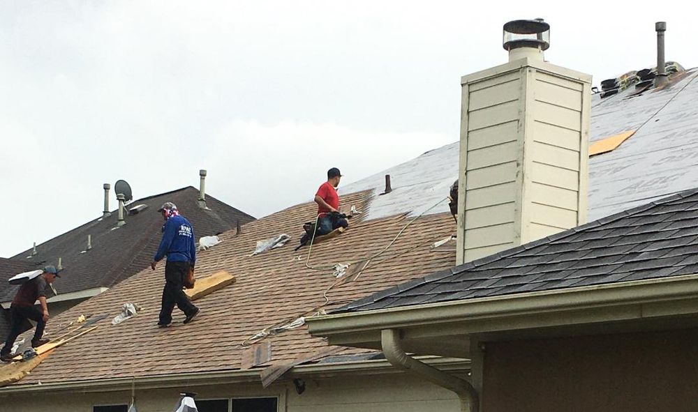 Slide of Johnny's Roofing and storm restoration