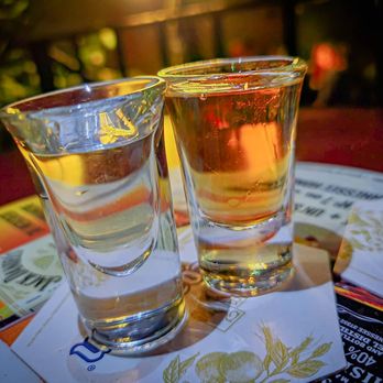 Pub le Sainte-Élisabeth - two shot glasses on a table - Pubs Near Me - Montreal, Quebec Pub le Sainte-Élisabeth - two shot glasses on a table - Pubs Near Me - Montreal, Quebec