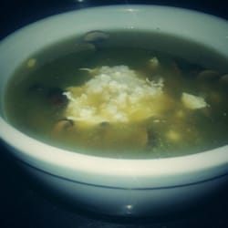 Mariachi Mexico - Tomatillo porcini mushroom soup topped off with requeson.