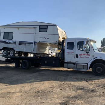 Pacheco's Towing - Picking up a trailer no other towing company wanted to pick up because it was too difficult for them, but easy for us. - Towing Near Me - Fresno, California Pacheco's Towing - Picking up a trailer no other towing company wanted to pick up because it was too difficult for them, but easy for us. - Towing Near Me - Fresno, California