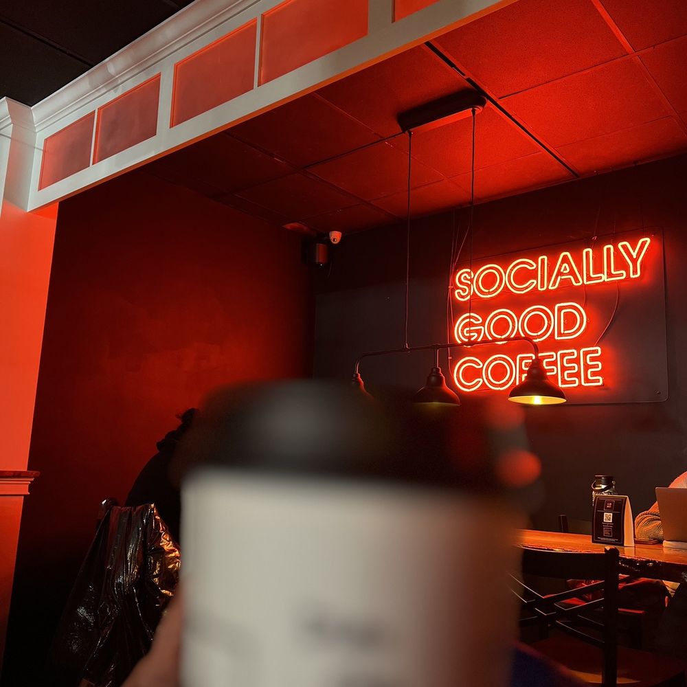 CoHo Coffee House - a person holding a cup of coffee - Coffee & Tea Near Me - Patchogue, New York CoHo Coffee House - a person holding a cup of coffee - Coffee & Tea Near Me - Patchogue, New York