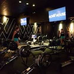 Row House - Inside the studio with the water wall and monitors to show how we row together.