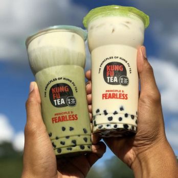 Kung Fu Tea - two people holding up their drinks - Bubble Tea Near Me - Fort Worth, Texas Kung Fu Tea - two people holding up their drinks - Bubble Tea Near Me - Fort Worth, Texas