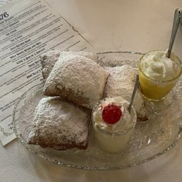 Vieux Carre Beignets with coconut lime curd and pineapple whip featured for tiki month Vieux Carre Beignets with coconut lime curd and pineapple whip featured for tiki month