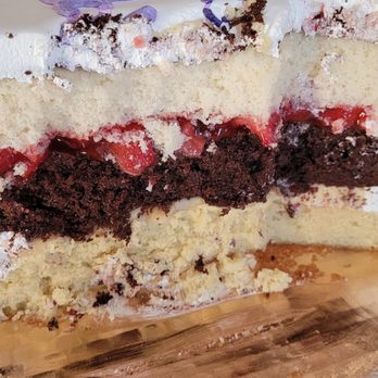 Milano Bakery - Whipped Cream? Atomic cake inside. - Bakeries Near Me - Joliet, Illinois