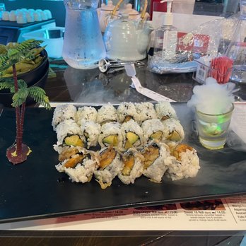 Koi Sushi - Veggie rolls (sweet potato up front, mango avocado in middle, avocado peanut in back) - Japanese Near Me - Chicago, Illinois Koi Sushi - Veggie rolls (sweet potato up front, mango avocado in middle, avocado peanut in back) - Japanese Near Me - Chicago, Illinois