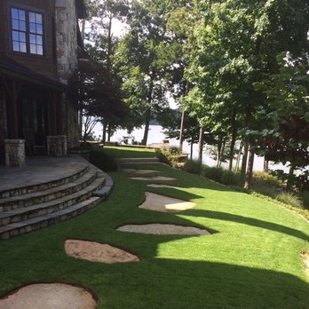 Common Ground Landscapes - a lawn with stepping stones - Landscaping Near Me Common Ground Landscapes - a lawn with stepping stones - Landscaping Near Me