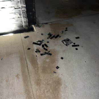 The Fives Oceanfront - Broken, fallen tiles from feature wall left in walkway near pool. A Danger for bare feet coming out of pool - Hotels Near Me - Puerto Morelos, ROO
