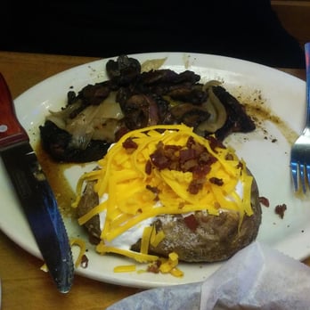 Texas Roadhouse - 12 ounce steak with loaded baked potato - Steakhouses Near Me - Dundalk, Maryland Texas Roadhouse - 12 ounce steak with loaded baked potato - Steakhouses Near Me - Dundalk, Maryland