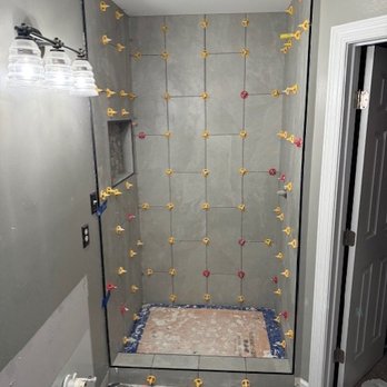 Boxer Remodeling & Renovations - 12x24 tiles (Dove Grey) from Lowes installed vertical - General Contractors Near Me