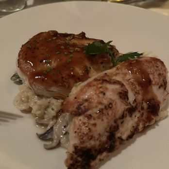 The Capital Grille - Roasted Chicken Breast with Mushrooms and Parmesan Risotto - Steakhouses Near Me - Burlington, Massachusetts The Capital Grille - Roasted Chicken Breast with Mushrooms and Parmesan Risotto - Steakhouses Near Me - Burlington, Massachusetts