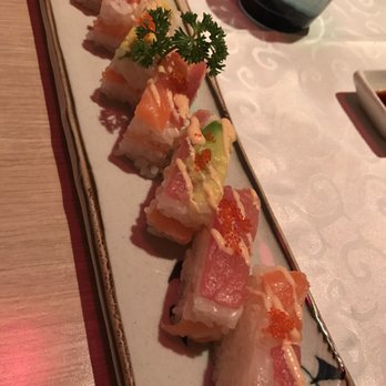 Hoseki - Looks good, but the slices of fish are razor thin and do not completely cover the middle layer sandwiched between the beds of rice. - Japanese Near Me - Florence, FI