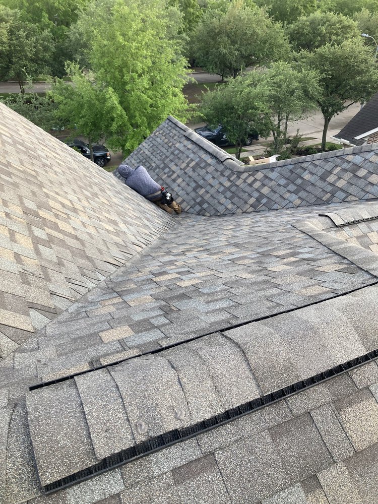 Slide of Compass Roofing