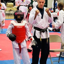 Rodness' Martial Arts Center - Master Rodness mentally prepares his student before a tournament sparring match.