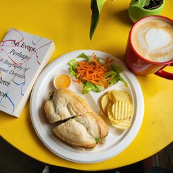 Grindstone Cafe - A lovely sandwich made with avocado, tomato, egg and cheese