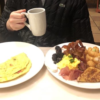 Liberty Tavern - Only half or actually a third of what we had. Also ordered waffles, served on a hot plate, and it was delicious!!! Want some more already! - American Near Me - Rosemont, Illinois