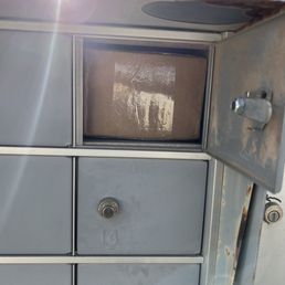 A box shoved into my tiny mailbox