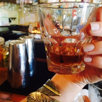 Dive Bar and Lounge - Black Manhattan. Created by dive bar lounge - Dive Bars Near Me - Austin, Texas