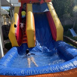 Kids having a blast on the slide Kids having a blast on the slide