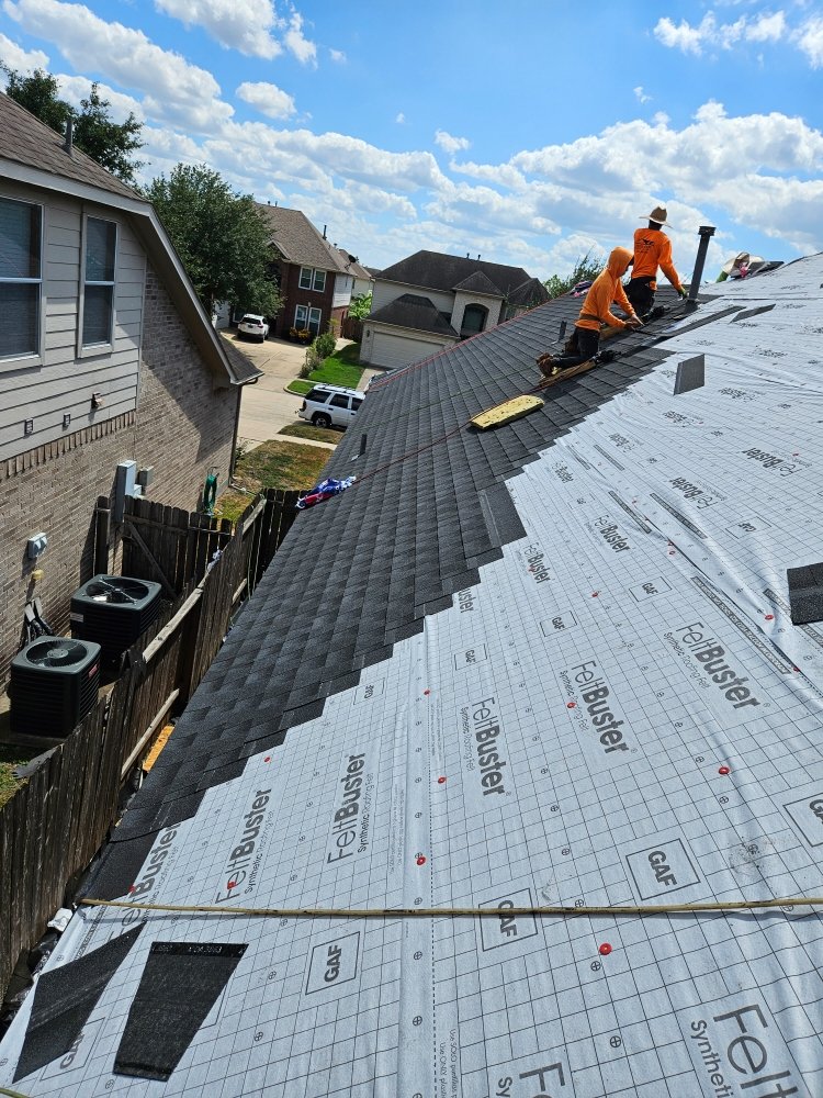 Slide of Daniel's Roofing and Painting