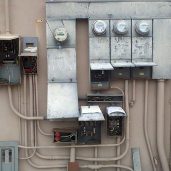 Mass Electric - Existing service on an old strip center that required upgrading in order to add a new AT&T cell site on the property. - Electricians Near Me