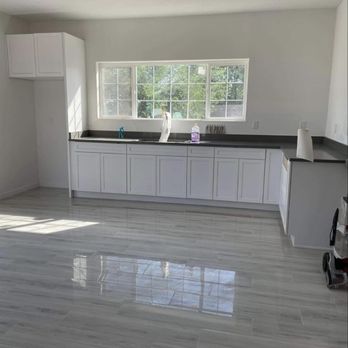 O&K Construction - a clean kitchen with white cabinets - General Contractors Near Me