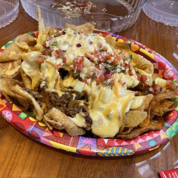 Capt. Cook's - Pulled Pork Nachos - American Near Me - Lake Buena Vista, Florida Capt. Cook's - Pulled Pork Nachos - American Near Me - Lake Buena Vista, Florida