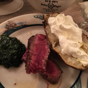 Peter Luger - Slice of filet and sirloin, medium rare - Steakhouses Near Me - Brooklyn, New York