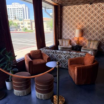 The Living Room - Front couches with nice tall windows overlooking California street. - Cocktail Bars Near Me - Reno, Nevada The Living Room - Front couches with nice tall windows overlooking California street. - Cocktail Bars Near Me - Reno, Nevada