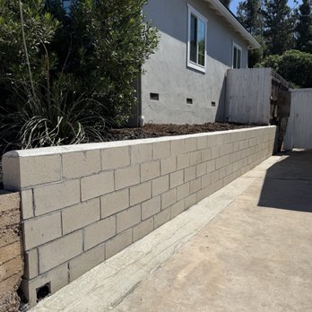 Minez Concrete - Finished wall with proper drainage - Masonry/Concrete Near Me Minez Concrete - Finished wall with proper drainage - Masonry/Concrete Near Me