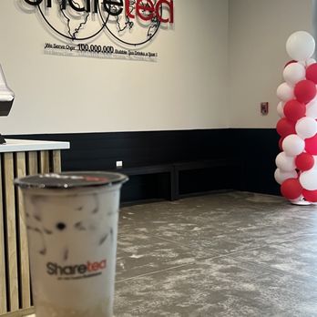 Share Tea - a cup of bubble tea on a table - Bubble Tea Near Me - Charlotte, North Carolina