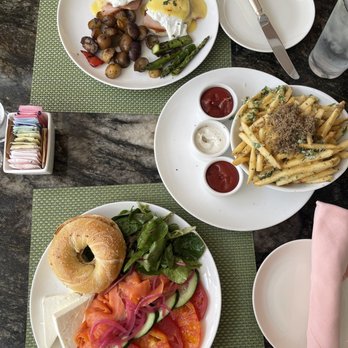 The Cabana Cafe - Eggs Benedict (Top) Truffle fries (right side) Lox & Bagel (Bottom) - Diners Near Me - Beverly Hills, California The Cabana Cafe - Eggs Benedict (Top) Truffle fries (right side) Lox & Bagel (Bottom) - Diners Near Me - Beverly Hills, California