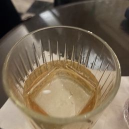 Bourbon drink with a large cube ice...how it should be served!! Nice!!! Bourbon drink with a large cube ice...how it should be served!! Nice!!!