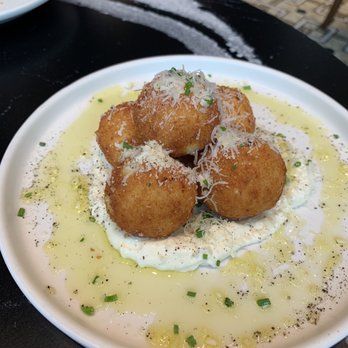 OLIVIA - Appetizer rice balls with a creamy texture on the inside - Italian Near Me - Tampa, Florida OLIVIA - Appetizer rice balls with a creamy texture on the inside - Italian Near Me - Tampa, Florida