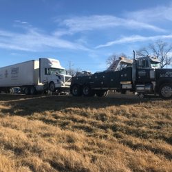 Craig's Towing - Semi hauler at work.