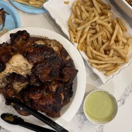 Chicken, fries, and green sauce