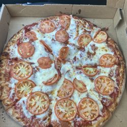 Specialty Pizza - Large 3 topping pizza of pepperoni, garlic and tomatoes. Absolutely delicious without being greasy!