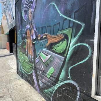 DJ Playing The Beats - View from right - Public Art Near Me - Oakland, California DJ Playing The Beats - View from right - Public Art Near Me - Oakland, California