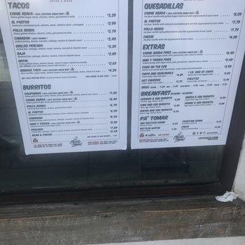 The Taco Stand - Menu visible on the window from out front. - Tacos Near Me - Encinitas, California