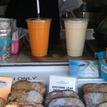 Juicy Lucy Juice Bar - (Left) papaya mango smoothie (right) piña colada smoothie - Juice Bars & Smoothies Near Me - New York, New York Juicy Lucy Juice Bar - (Left) papaya mango smoothie (right) piña colada smoothie - Juice Bars & Smoothies Near Me - New York, New York