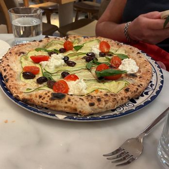 Eataly - Flatiron - Pizza zucchine & stracciatella. Looks pretty, but my friend was underwhelmed. - Italian Near Me - New York, New York Eataly - Flatiron - Pizza zucchine & stracciatella. Looks pretty, but my friend was underwhelmed. - Italian Near Me - New York, New York