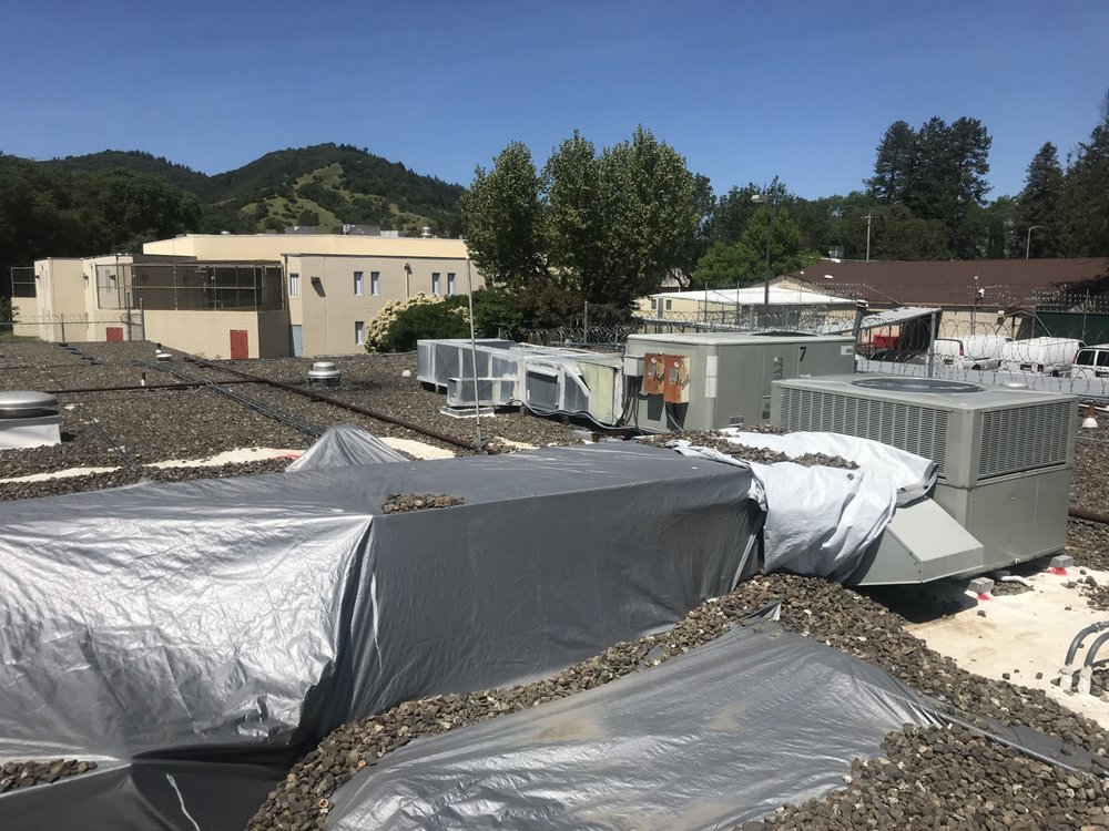 Slide of Dan George Roofing