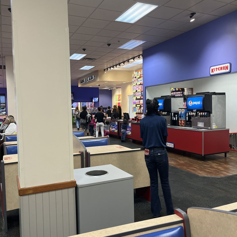 Chuck E. Cheese - Staff standing around - Pizza Near Me - Independence, Missouri Chuck E. Cheese - Staff standing around - Pizza Near Me - Independence, Missouri
