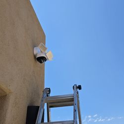 Replace existing Floodlights with motion detection, tracking camera with bright LED.