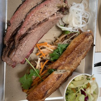 Hometown Bar-B-Que - 1/2 pound of brisket, lamb belly bahn mi and hometown slaw - Barbeque Near Me - Miami, Florida Hometown Bar-B-Que - 1/2 pound of brisket, lamb belly bahn mi and hometown slaw - Barbeque Near Me - Miami, Florida