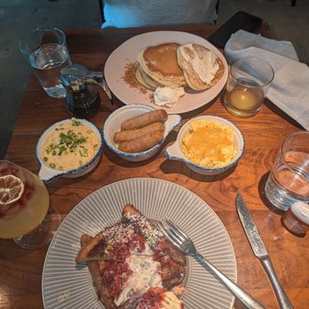 Unconventional Diner - The table. with Exhausted orange juice lol - Breakfast & Brunch Near Me - Washington, DC, District of Columbia