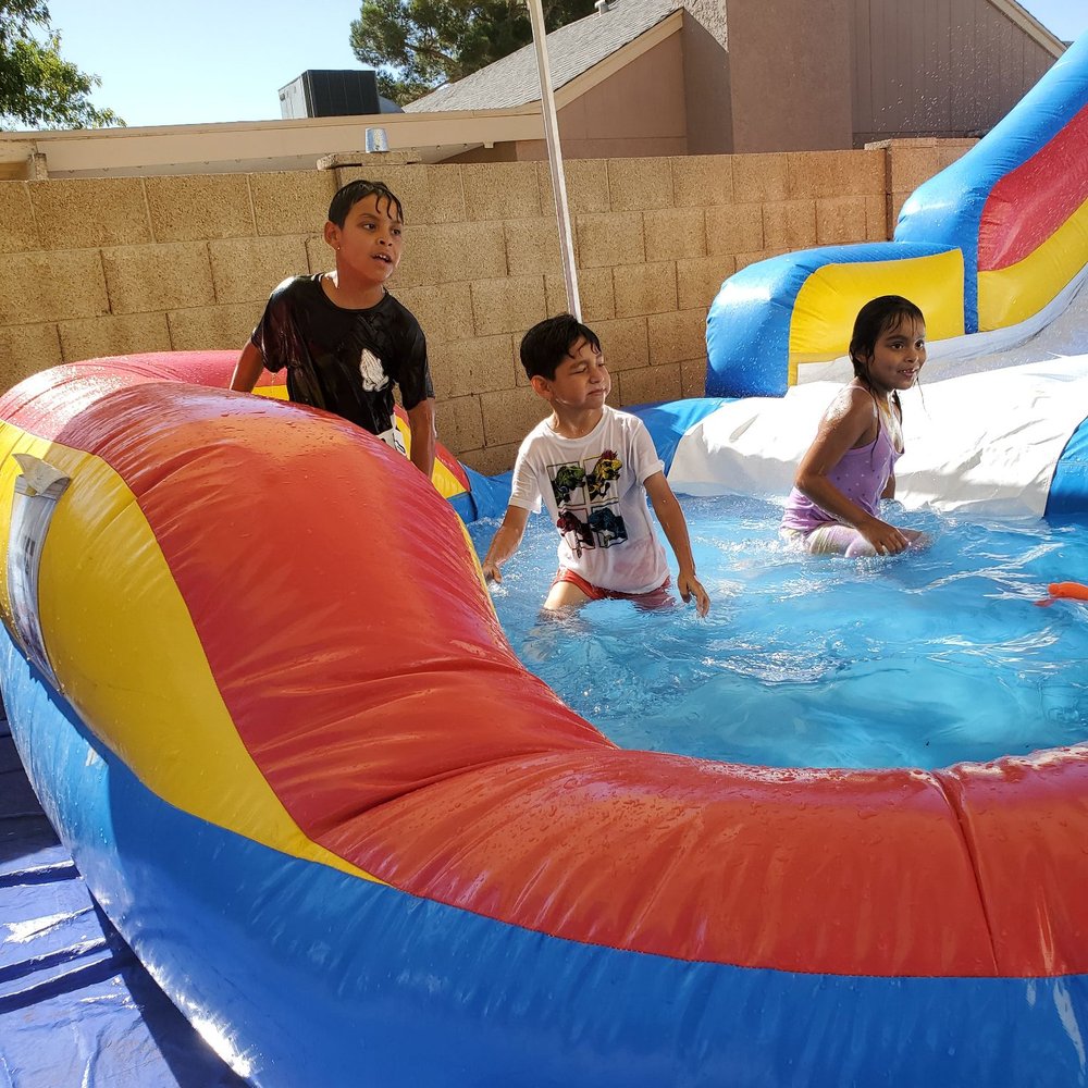 Az Jolly Jumpers - Enjoying the pool at the end of the slide. - Party Supplies Near Me - Phoenix, Arizona Az Jolly Jumpers - Enjoying the pool at the end of the slide. - Party Supplies Near Me - Phoenix, Arizona
