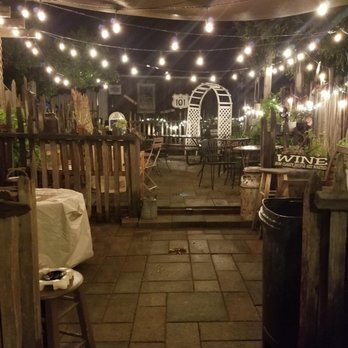 Bear's Hideaway - Patio with killer ambience and fun lighting. - Wine Bars Near Me - San Juan Bautista, California