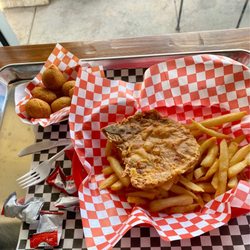 Calliope's Seafood & PoBoys - Lunch pork chop combo with side of hush puppies